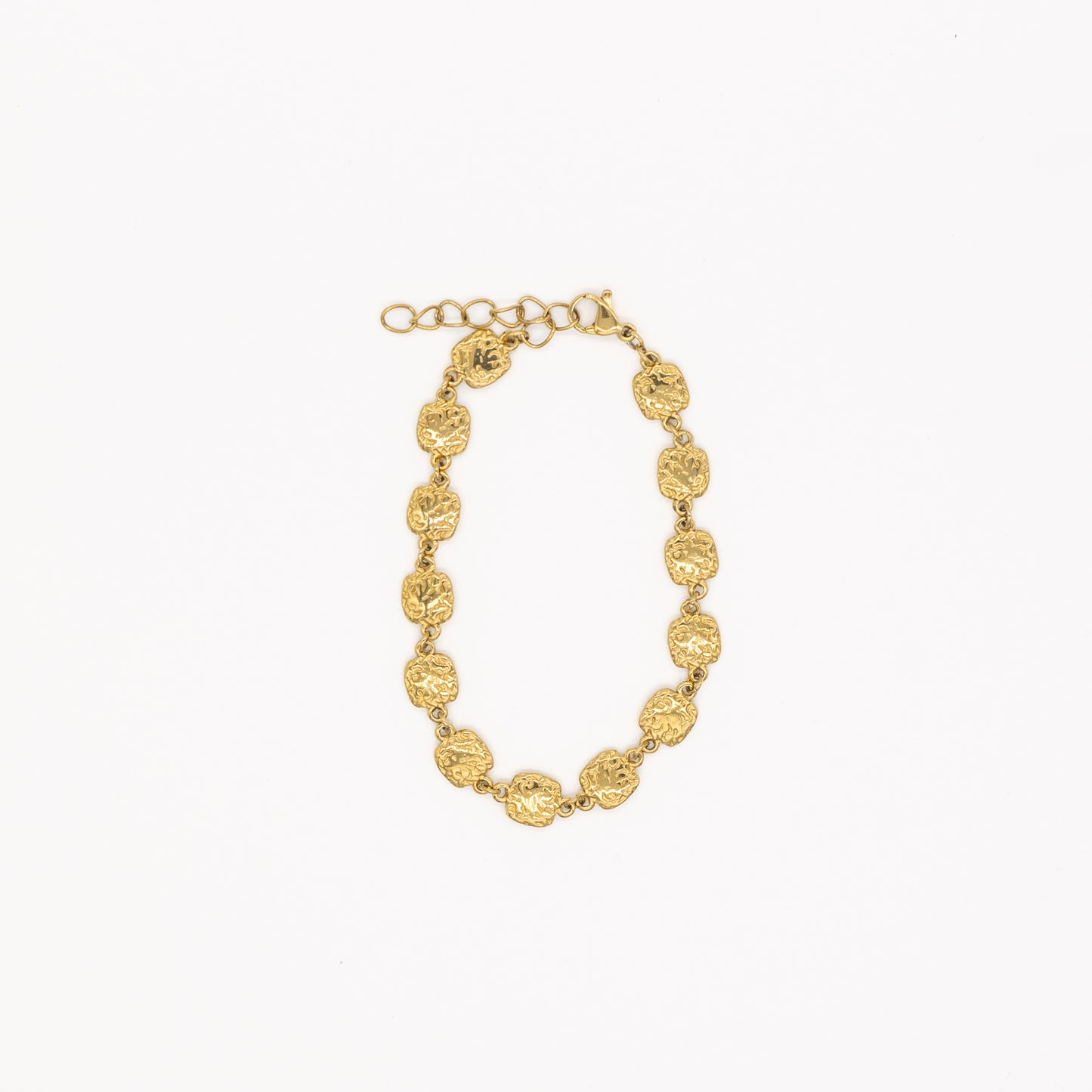 Gold bracelet on a white background