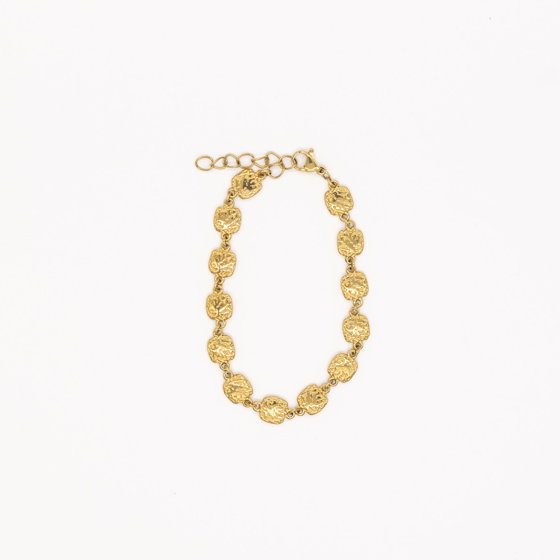Gold bracelet on a white background
