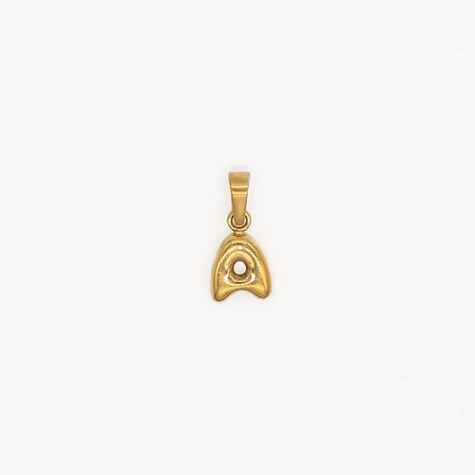 Gold pendant on a white background
